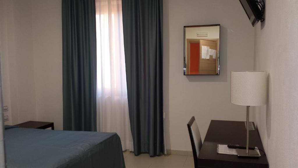 Buddi Hotel Platamona Habitación foto