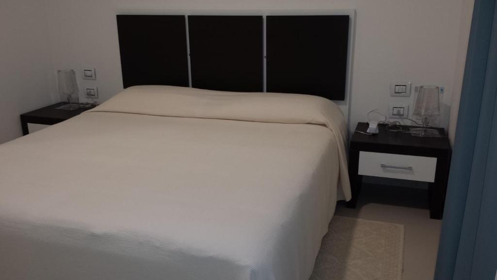 Buddi Hotel Platamona Habitación foto